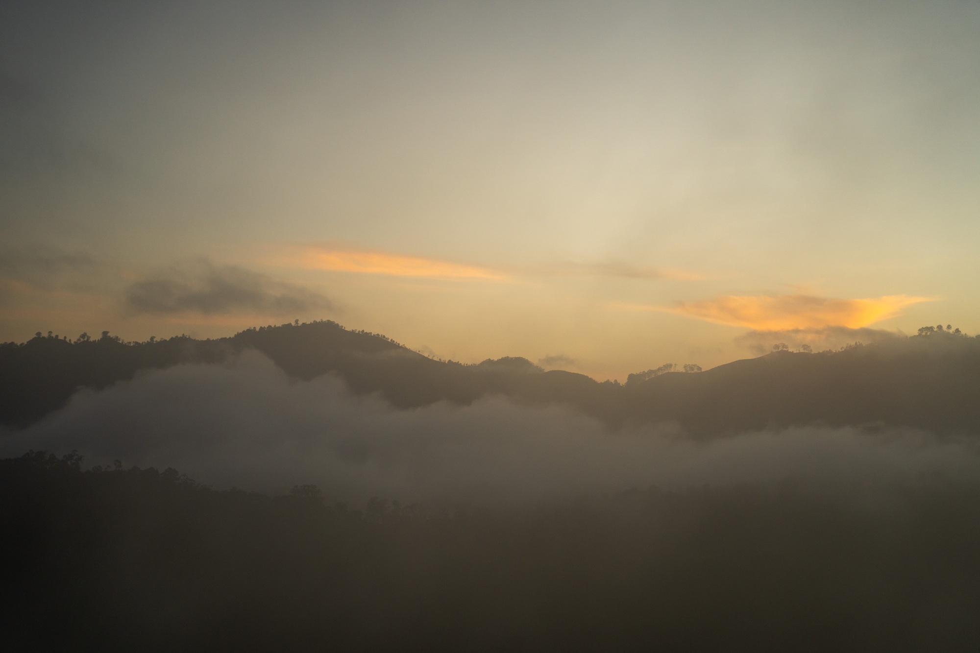 Little Adam's Peak landscape during a stunning sunrise in Ella, Sri Lanka